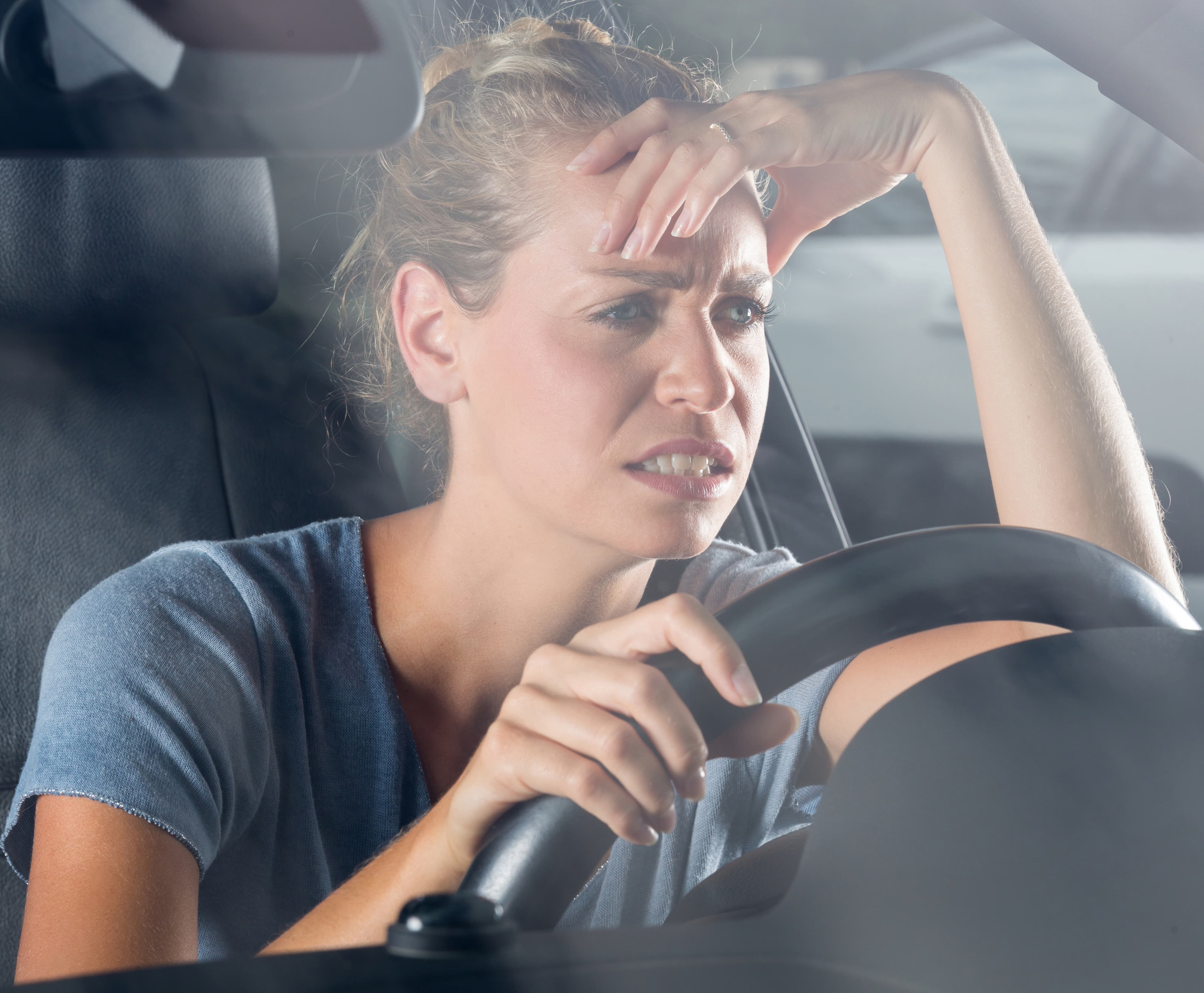 Whining, complaining, and upset woman in road traffic jam